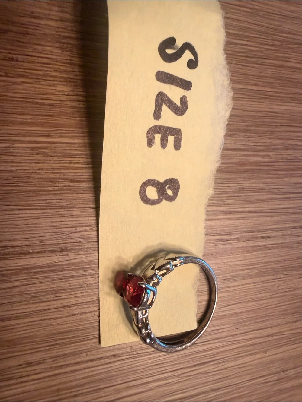 Size 8 Silver Tone Band Ring with Oval Red Stone Prong Setting 1 Gemstone